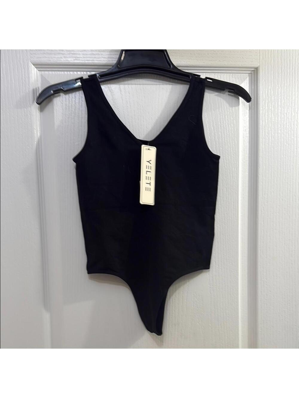 Yelete Black Bodysuit with Deep V-neck and High-cut Legs